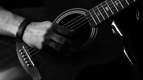 A young boy plays a guitar Video stock 145508814