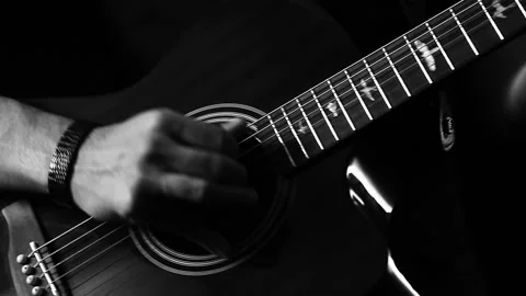 A young boy plays a guitar Video stock 145508921