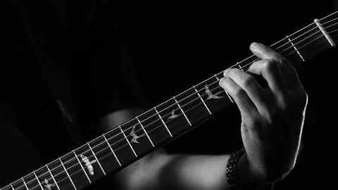A young boy plays a guitar Video stock 145508942