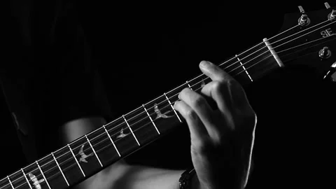 A young boy plays a guitar Video stock 145508958