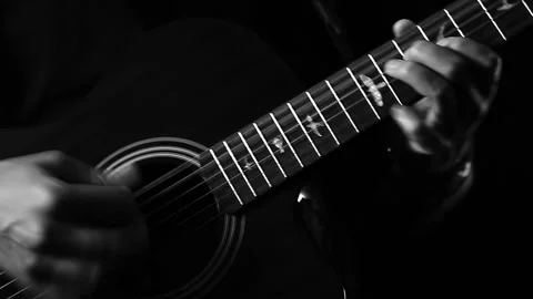 A young boy plays a guitar Video stock 145509109