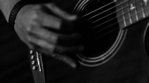 A young boy plays a guitar Stock Footage 145509239