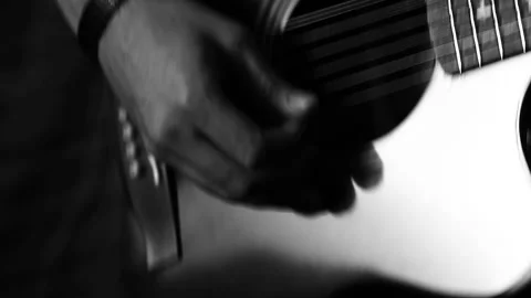 A young boy plays a guitar 動画素材 145509329