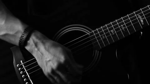 A young boy plays a guitar Stock Footage 145509389