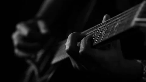 A young boy plays a guitar Stock Footage 145509422
