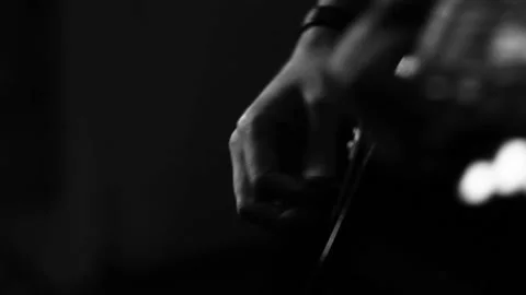 A young boy plays a guitar Stock Footage 145509525