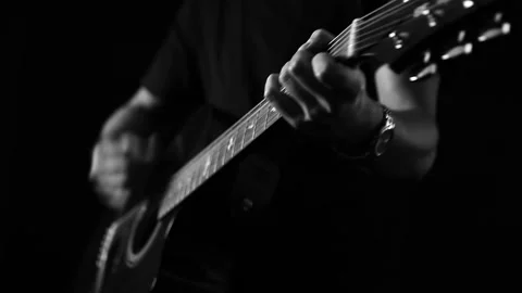 A young boy plays a guitar Stock Footage 145509597