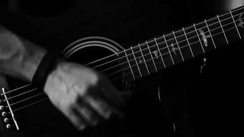 A young boy plays a guitar Stock Footage 145509623