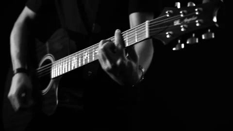 A young boy plays a guitar Stock Footage 145509634