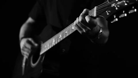 A young boy plays a guitar Stock Footage 145509645