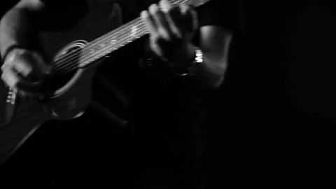 A young boy plays a guitar Stock Footage 145509739