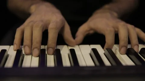 A young boy plays a keyboard 動画素材 145508510