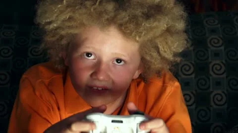Young Boy Plays Video Game Video stock 10878313