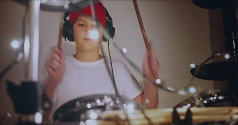 Young boy practice playing electronic instrument drums at living room at home Stock-Footage 132107415