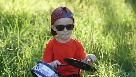 Young boy practice playing instrument drums. Teenager rock band drummer. Kid Stock Footage 248206286