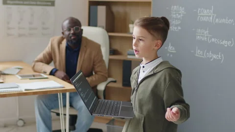 Young Boy Presenting on Programming Lesson 스톡 동영상 244698382