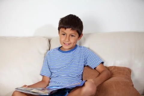 Young boy reading Stock Photos
