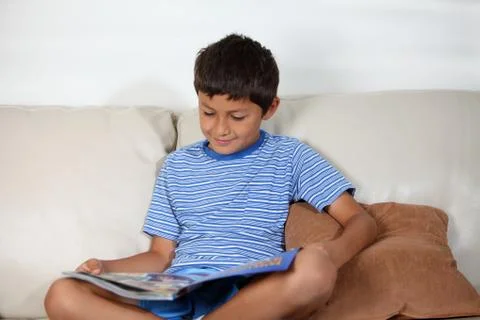 Young boy reading Stock Photos