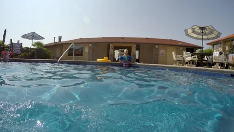 Young boy refused to come in pool Video stock 94229510