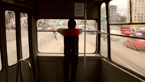 Young Boy Riding Tram And Looking Out The Window Video stock 70063459