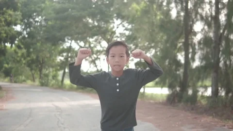 Young boy running during summer day Stock Footage 113176479