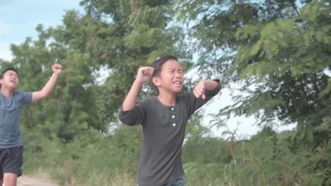 Young boy running during summer day Stock Footage 120278978