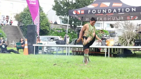 Young boy from Samoa juggling with a burning stick Stock Footage 237833412