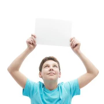 Young boy with a sheet of paper Stock Photos