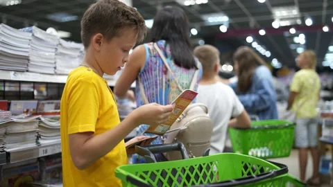 Young boy in shop Stock Footage 135987309