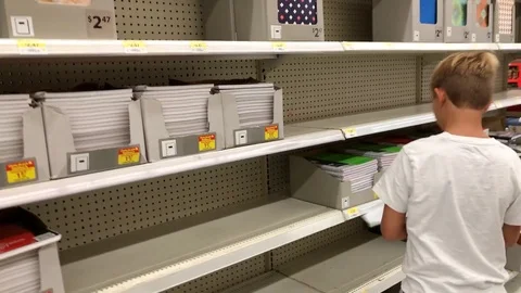 Young boy shopping for back to school supplies Stock Footage 92926040