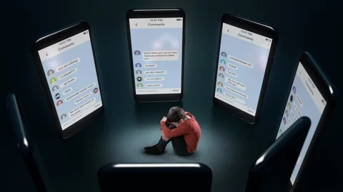 Young Boy Sitting and afraid a Big Formidable Phones with harassing messages 動画素材 108523860