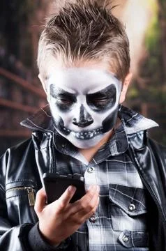 Young boy with skull make up Stock-Fotos