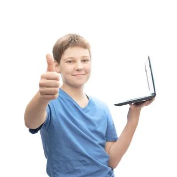 Young boy with a small notebook computer Stock Photos
