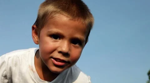 Young boy smiling and saying cheese Stockbeeldmateriaal 7909396