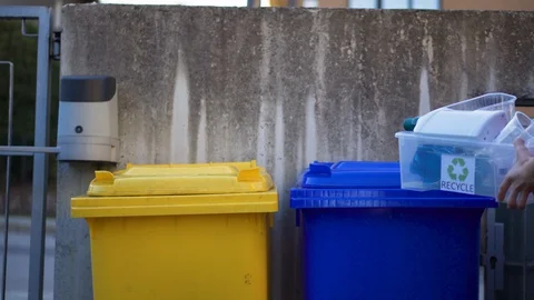 Young Boy Sorting Plastic at Home for Recycling. Refuse collection service. Stock Footage 127260613