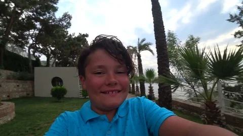 Young boy spinning Stock Footage 77006471