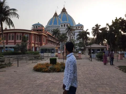 Young boy standing front of iskcon temple in mayapur, tovp temple, mayapur. Stock Photos