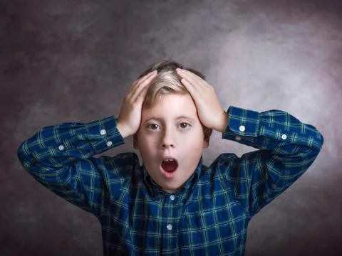 Young boy surprised. Stock Photos