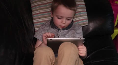 Young boy on tablet 库存影片 47142700