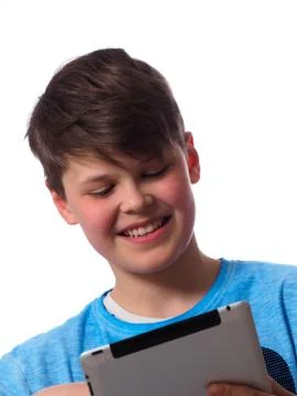 Young boy with a tablet Stock Photos