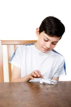 Young boy taking a cigarette Foto stock