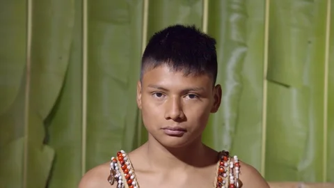 Young boy telling the viewer that something crazy is going on in ecuador Stock Footage 113217313