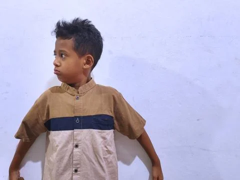 Young boy with a thoughtful expression Stock Photos