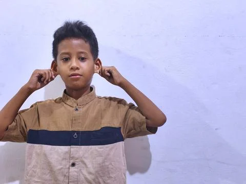 Young boy with a thoughtful expression Stock Photos