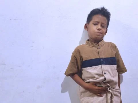 Young boy with a thoughtful expression Stock Photos