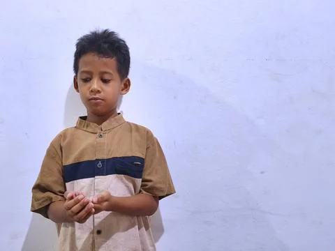 Young boy with a thoughtful expression Stock Photos
