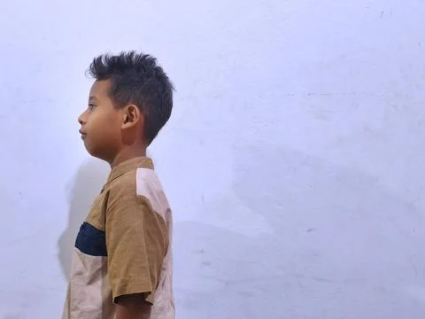 Young boy with a thoughtful expression Stock Photos