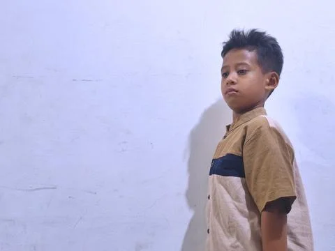 Young boy with a thoughtful expression Stock Photos