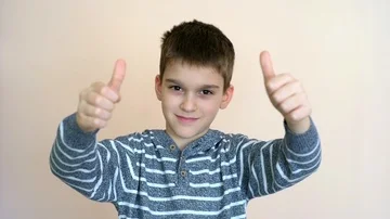 Young boy with thumbs up Stock Footage 86080908
