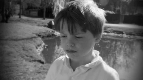 Young boy unsure of future runs away Stock-Footage 32740411